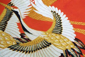 Kimono Symbol Kraniche auf rotem hintergrund